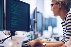 developer coding at desk