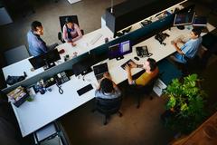 group sitting at desk working