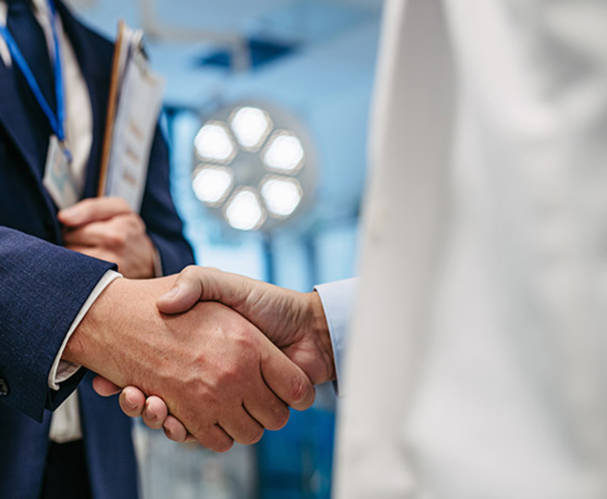 shaking hands in a hospital