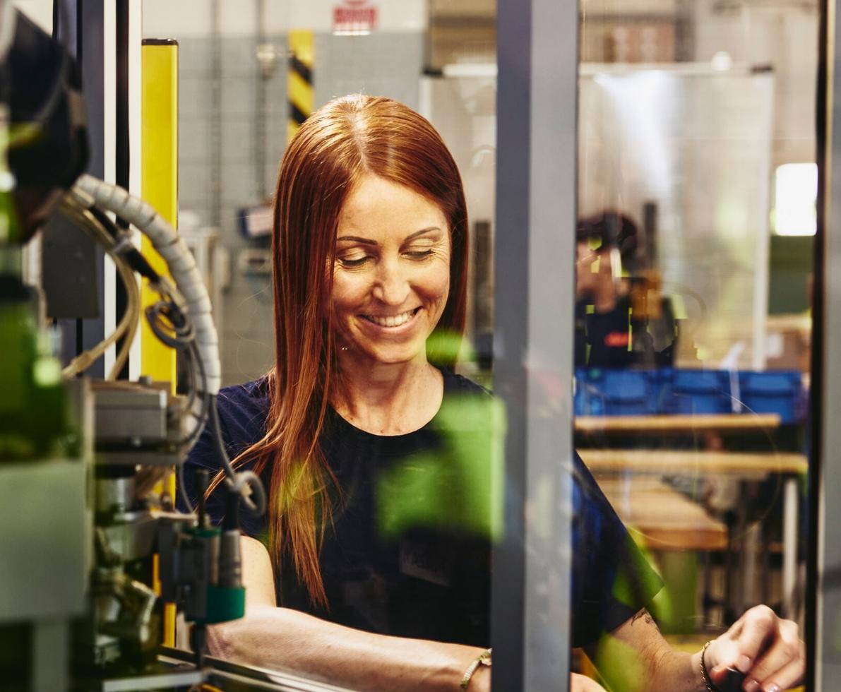 women working on a manufacturing site